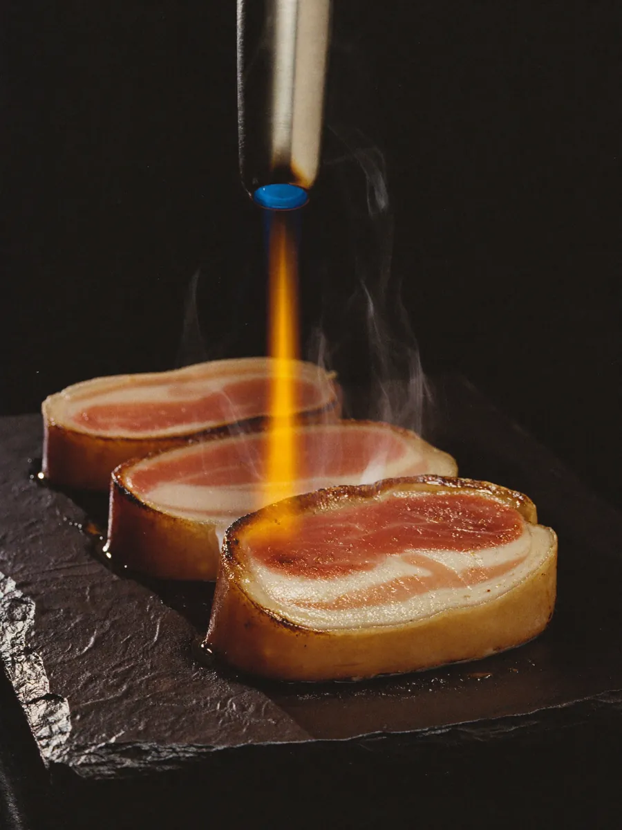 Macro shot of seared chashu pork belly slices