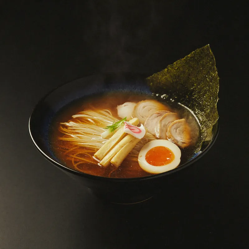 Tokyo Shoyu ramen with clear amber broth, chicken and nori